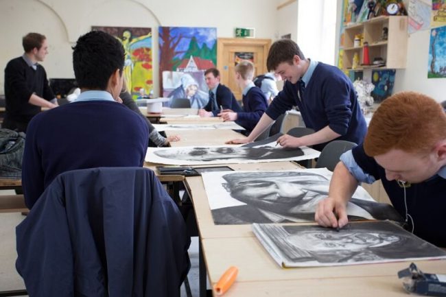 Exchange students with Irish students in art class at high school in Ireland